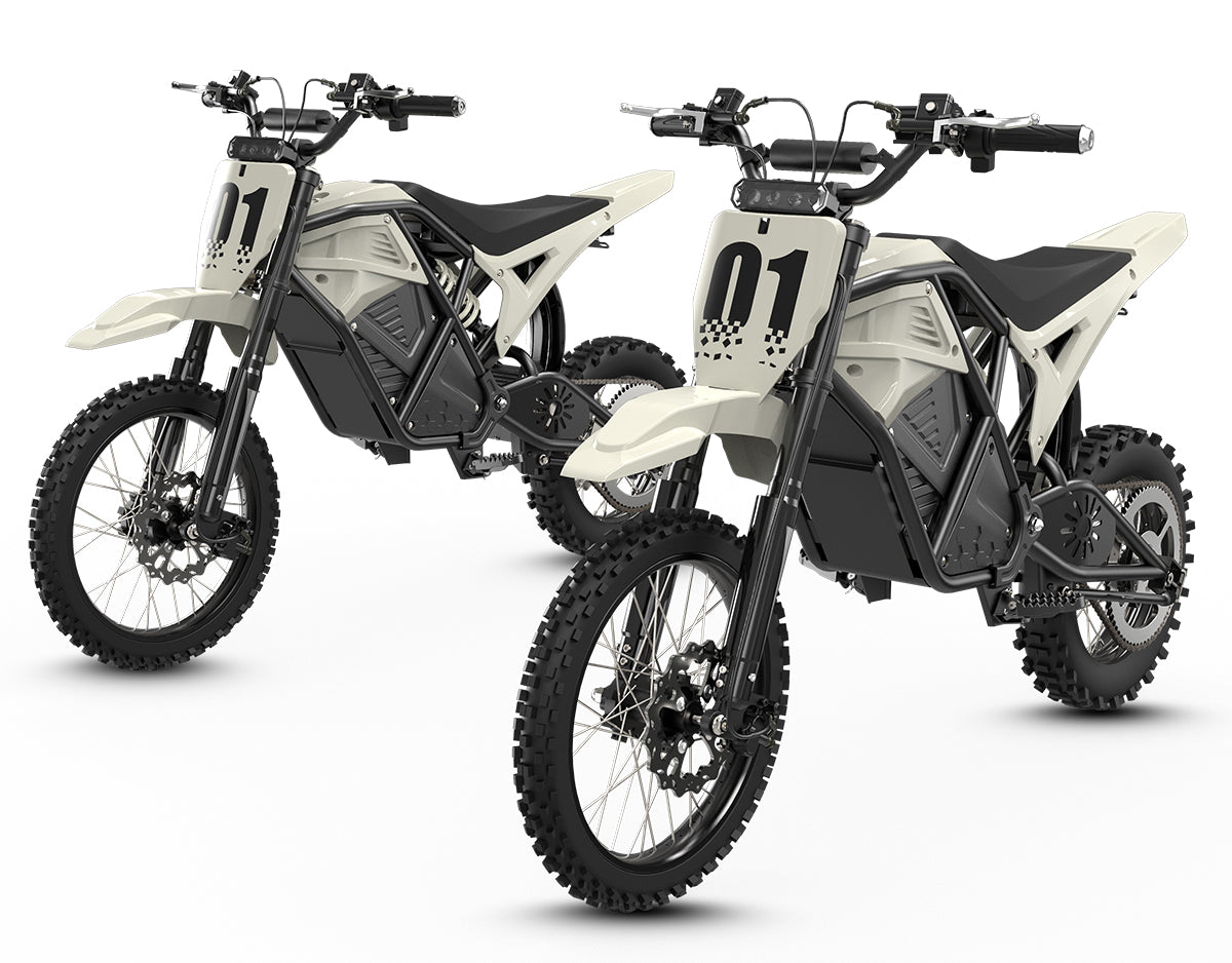 Two white KOVO Nova Mini electric dirt bike front view